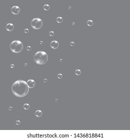 Grey background with soap bubbles