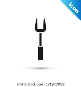 Icono de horquilla de la parrilla gris aislado en fondo blanco. Señal de horquilla de barbacoa. Parrillada y barbacoa.  Vector