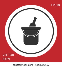 Grey Bottle of wine in an ice bucket icon isolated on red background. Circle button. Vector Illustration
