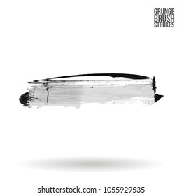 Grey  brush stroke and texture. Grunge vector abstract hand - painted element. Underline and border design.