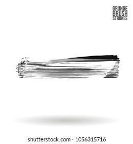 Grey  brush stroke and texture. Grunge vector abstract hand - painted element. Underline and border design.