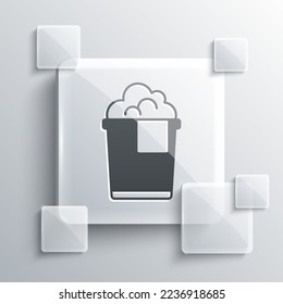 Grey Bucket with foam and bubbles icon isolated on grey background. Cleaning service concept. Square glass panels. Vector