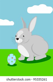 Grey bunny with an easter egg