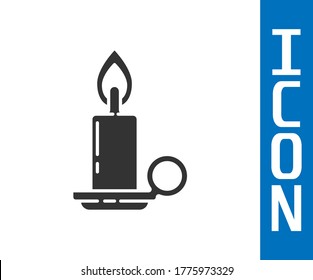 Grey Burning candle in candlestick icon isolated on white background. Cylindrical candle stick with burning flame.  Vector Illustration