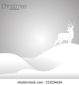 a grey christmas card with a reindeer and some text