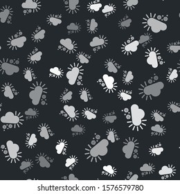 Grey Cloudy with snow icon isolated seamless pattern on black background. Cloud with snowflakes. Single weather icon. Snowing sign.  Vector Illustration