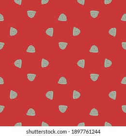 Grey colored beanie hat print seamless pattern in hand drawn style. Pale red background. Stock illustration. Vector design for textile, fabric, giftwrap, wallpapers.