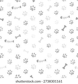 Grey colored paw prints, bones and fish bones background. Seamless fabric design pattern