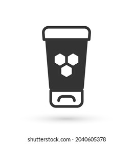 Grey Cosmetic tube with honey icon isolated on white background. Natural skin care.  Vector