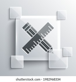 Grey Crossed ruler and pencil icon isolated on grey background. Straightedge symbol. Drawing and educational tools. Square glass panels. Vector