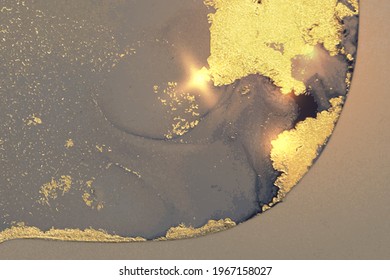 Grey, dark blue, and gold pattern with texture of geode and sparkles. Abstract vector background in alcohol ink technique. Modern paint with glitter. Template for banner, poster design. Fluid art