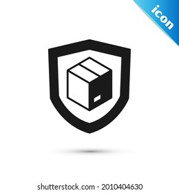 Grey Delivery security with shield icon isolated on white background. Delivery insurance. Insured cardboard boxes beyond the shield.  Vector