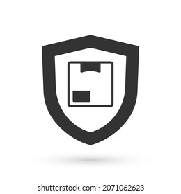 Grey Delivery security with shield icon isolated on white background. Delivery insurance. Insured cardboard boxes beyond the shield.  Vector