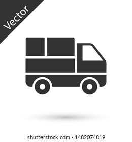 Grey Delivery truck with cardboard boxes behind icon isolated on white background.  Vector Illustration