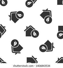Grey Eco friendly house icon isolated seamless pattern on white background. Eco house with leaf. Vector Illustration