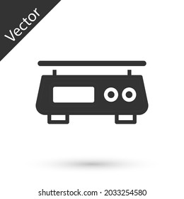 Icono de escalas electrónicas grises aislado en fondo blanco. Equipamiento para medir el peso.  Vector