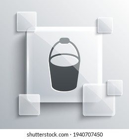 Grey Fire bucket icon isolated on grey background. Metal bucket empty or with water for fire fighting. Square glass panels. Vector