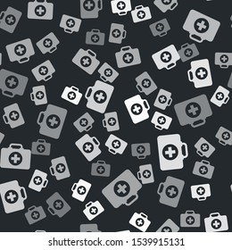 Grey First aid kit icon isolated seamless pattern on black background. Medical box with cross. Medical equipment for emergency. Healthcare concept.  Vector Illustration