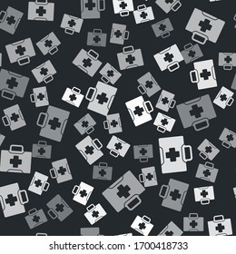 Grey First aid kit icon isolated seamless pattern on black background. Medical box with cross. Medical equipment for emergency. Healthcare concept. Vector Illustration