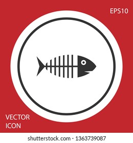 Grey Fish skeleton icon isolated on red background. Fish bone sign. White circle button. Vector Illustration