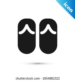 Icono de Flip gris aislado en fondo blanco. Señales de las zapatillas de playa.  Vector