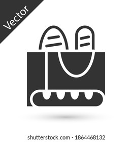 Grey French baguette bread icon isolated on white background. Vector.