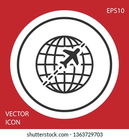 Grey Globe with flying plane icon isolated on red background. Airplane fly around the planet earth. Aircraft world icon. Circle button. Vector Illustration