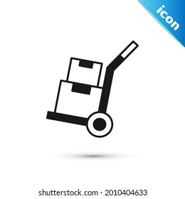 Grey Hand truck and boxes icon isolated on white background. Dolly symbol.  Vector
