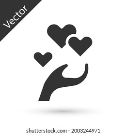Grey Heart in hand icon isolated on white background. Hand giving love symbol. Valentines day symbol.  Vector