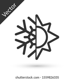 Grey Hot and cold symbol. Sun and snowflake icon isolated on white background. Winter and summer symbol.  Vector Illustration