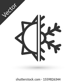 Grey Hot and cold symbol. Sun and snowflake icon isolated on white background. Winter and summer symbol.  Vector Illustration