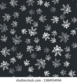Grey Hot and cold symbol. Sun and snowflake icon isolated seamless pattern on black background. Winter and summer symbol.  Vector Illustration