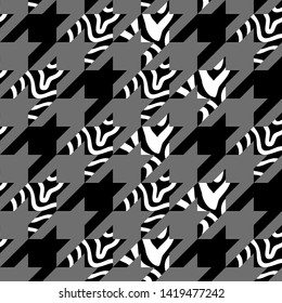 Grey hounds tooth print with zebra stripes. Seamless monochrome pattern with geometric elements. Autumn and winter textile collection.