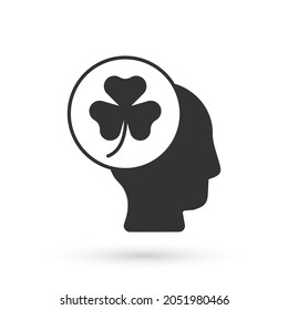 Grey Human head with clover trefoil leaf icon isolated on white background. Happy Saint Patricks day. National Irish holiday.  Vector