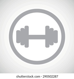 Grey image of barbell in circle, on white gradient background