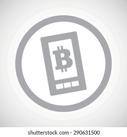 Grey image of bit coin symbol on phone screen in circle, on white gradient background