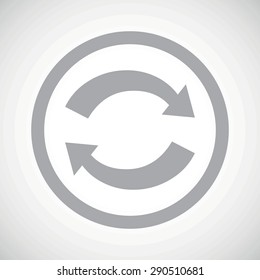 Grey image of exchange symbol in circle, on white gradient background