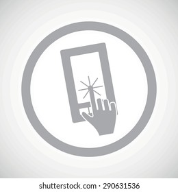 Grey image of hand touching phone screen in circle, on white gradient background