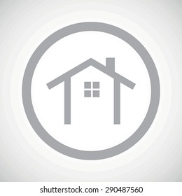 Grey image of house contour in circle, on white gradient background