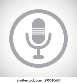 Grey image of microphone in circle, on white gradient background
