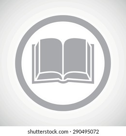 Grey image of open book in circle, on white gradient background