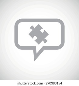 Grey image of puzzle piece in chat bubble, on white gradient background