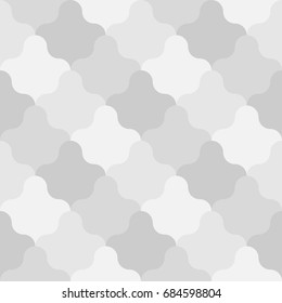 Grey interlocking figures tessellation background. Image with floral shapes. Ethnic mosaic tiles motif. Mosaic wallpaper. Seamless surface pattern design with scales ornament. Vector art illustration.