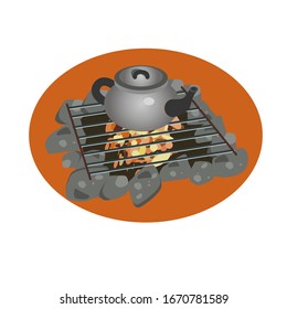 grey kettle on a bonfire