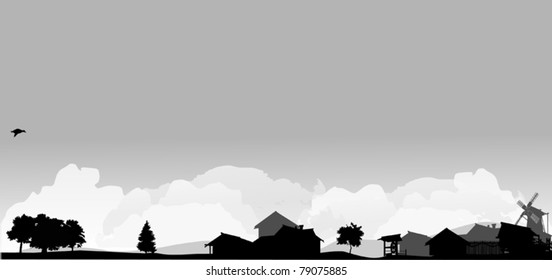 grey landscape with trees and village