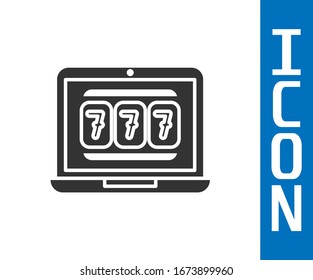 Grey Laptop and slot machine with lucky sevens jackpot icon isolated on white background. Online casino.  Vector Illustration