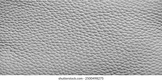 Grey leather texture. Leather background. Black and white leather surface close-up.