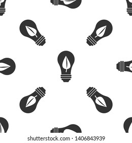 Grey Light bulb with leaf icon isolated seamless pattern on white background. Eco energy concept. Alternative energy concept. Vector Illustration