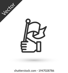 Icono de la bandera de la mano de la línea gris aislado en el fondo blanco. Victoria, triunfo y conquista el concepto de adversidad. Vector