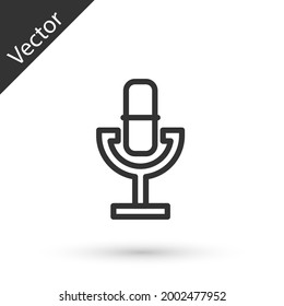 Grey line Microphone icon isolated on white background. On air radio mic microphone. Speaker sign.  Vector